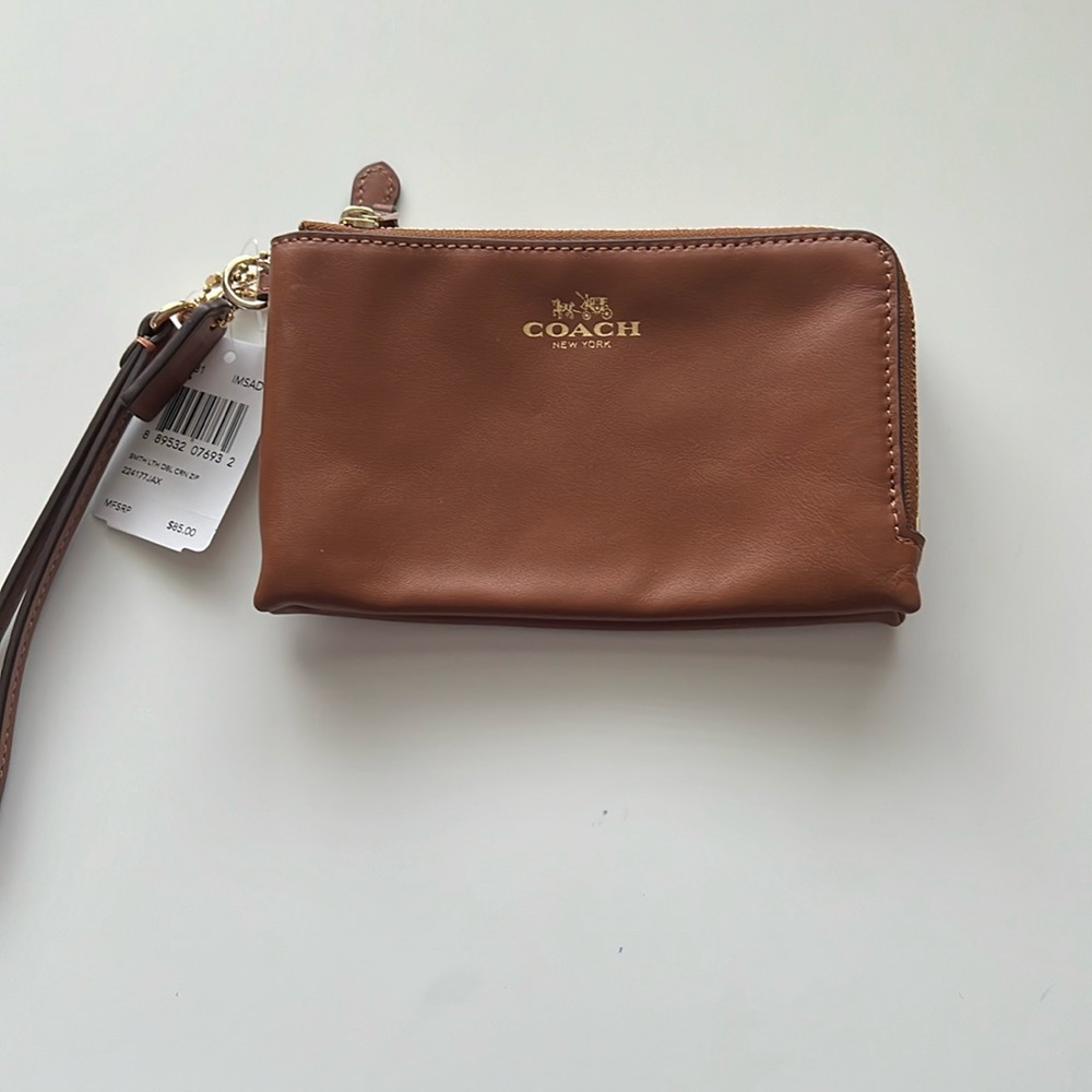 NWT tan Coach wristlet with two zippered pockets